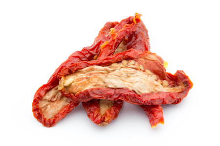 Dried tomatoes isolated on white background.の写真素材