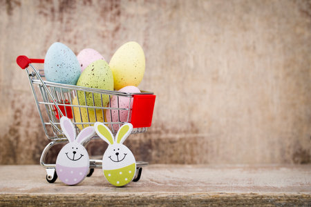Easter eggs in the cart. Spring discount card.の写真素材