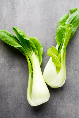 Fresh spinach on the gray mettal background.の写真素材