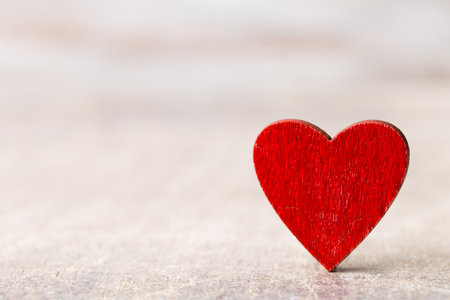Happy Valentines Day. Red Heart on a wooden background.の写真素材