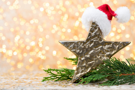 Christmas wooden decorations on a bokeh background.の写真素材