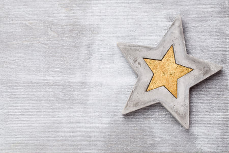 Christmas wooden decorations on a grey background.の写真素材