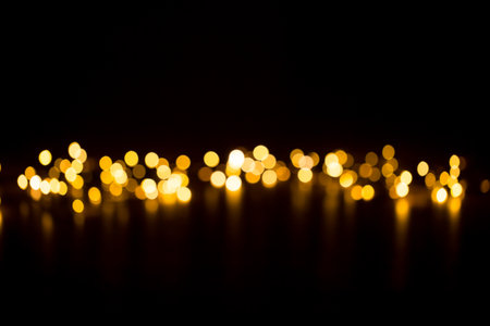Christmas background with light spots and bokeh.の写真素材