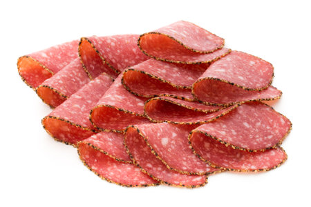 Salami slices isolated on the white background.の写真素材