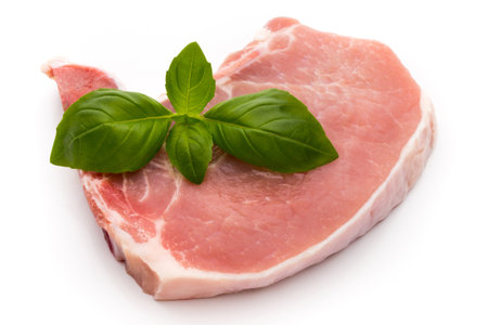 Fresh raw beef steak isolated on white background, top view.の写真素材
