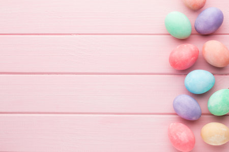 Pink pastel Easter eggs background. Spring greating card.