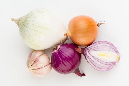Onion and spices isolated on white background, top view.の写真素材