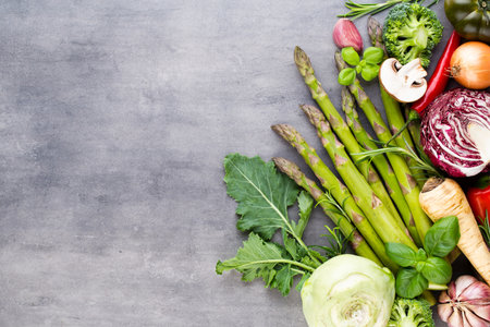 Fresh bio vegetables on the gray stone background.の写真素材