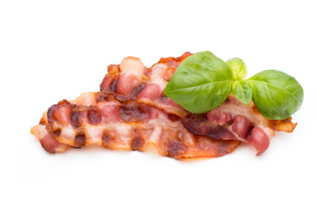 Sliced prosciutto or parma ham isolated on white background. From top viewの写真素材