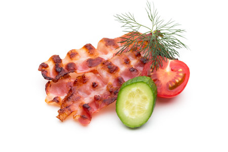 Sliced prosciutto or parma ham isolated on white background. From top viewの写真素材