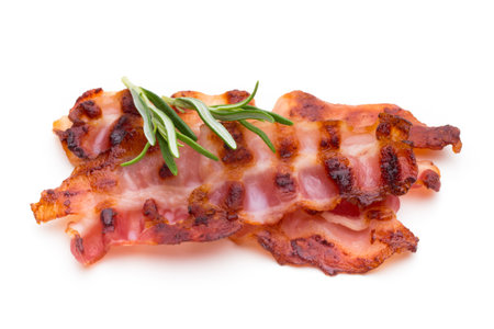 Sliced prosciutto or parma ham isolated on white background. From top viewの写真素材