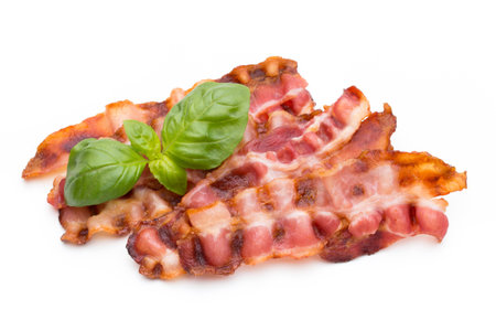 Sliced prosciutto or parma ham isolated on white background. From top viewの写真素材