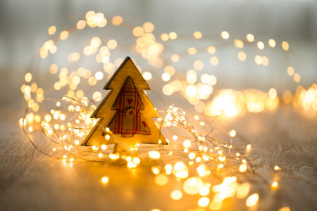 Christmas greeting card. Festive decoration on bokeh background. New Year concept. Copy space.  Flat...