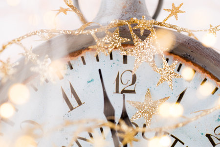 Abstract background with fireworks and clock close to midnight. Christmas and happy new years eve...