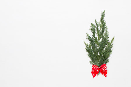 Christmas greeting card. Decoration on white wooden background. New Year concept. Copy space.  Flat...
