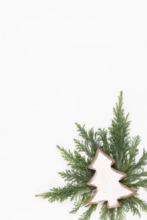 Christmas greeting card. Decoration on white wooden background. New Year concept. Copy space.  Flat lay. Top view.の写真素材