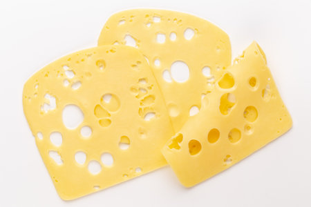 Cheese slice on white background.の写真素材