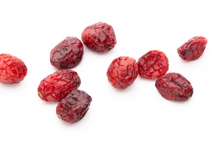 Dried cranberries isolated on white backgroundの写真素材