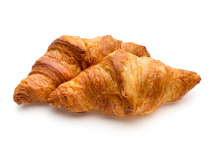 Tasty buttery croissants on the white background.の写真素材