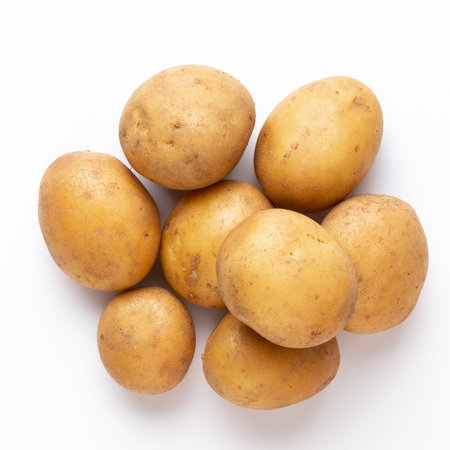 Potatoes isolated on white background. Flat lay. Top view.の写真素材