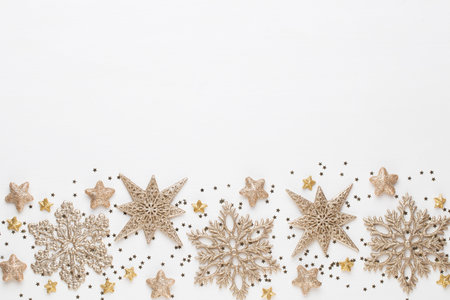 Christmas greeting card. Festive decoration on white wooden background. New Year concept. Copy...