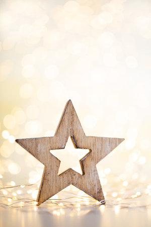 Christmas gold bokeh background with decorative star. Christmas gold stars. Christmas pattern. Background on the gray color. - Imageの写真素材