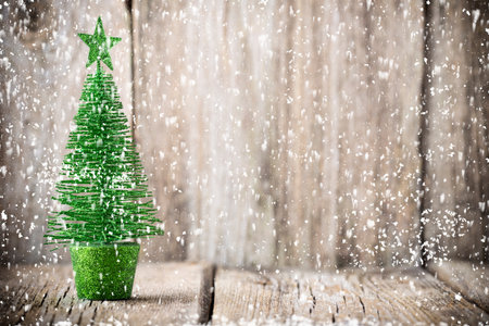 Christmas tree decoration over woodenの写真素材