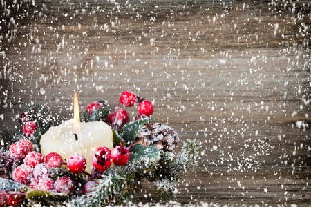 Christmas wreath from red berries, a fur-tree and cones.の写真素材