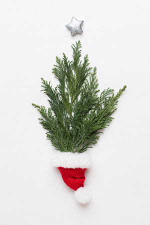 Christmas greeting card. Decoration on white wooden background. New Year concept. Flat lay. Top view.の写真素材