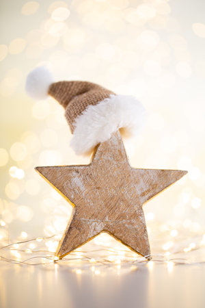 Christmas gold bokeh background with decorative star. Christmas gold stars.の写真素材