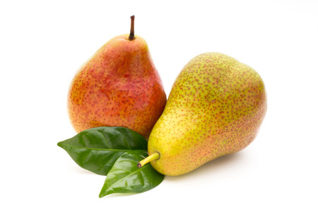 Fresh bio pear with leaves on isolated white background.の写真素材