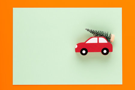 Christmas composition. Christmas decorations on orange background. Flat lay, top view, copy space.の写真素材