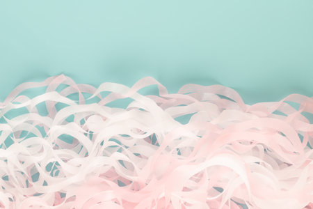 Abstract pink, blue and white ribbon background.
