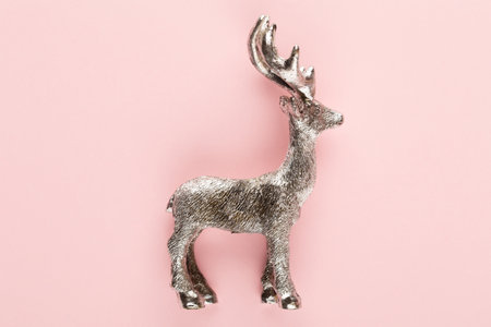 Abstract christmas decor. Christmas holiday new year concept minimal pink background.の写真素材