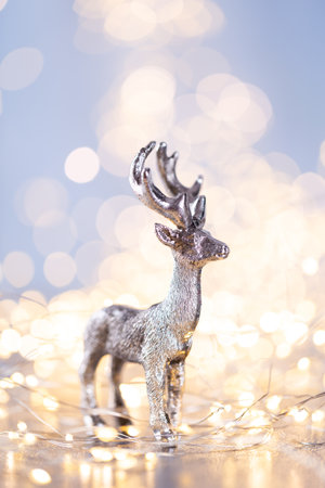 Christmas decor on blue bokeh background.の写真素材