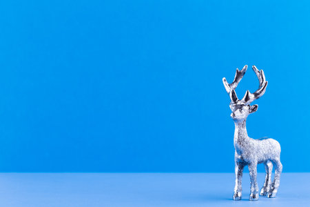 Christmas reindeer on pastel color background. Christmas or New Year minimal concept.の写真素材