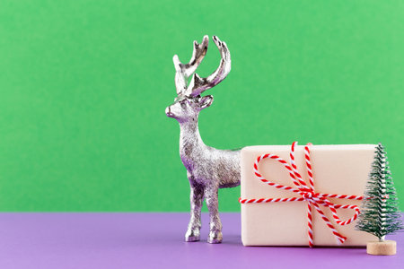 Christmas reindeer on pastel color background. Christmas or New Year minimal concept.の写真素材