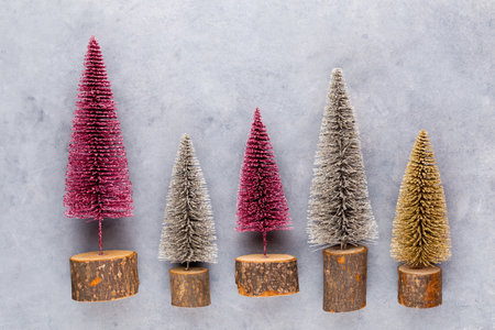 Christmas tree on pastel colored background. Christmas or New Year minimal concept.の写真素材