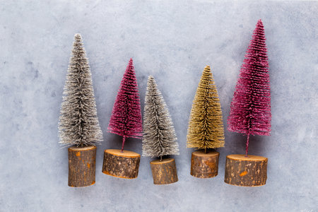 Christmas tree on pastel colored background. Christmas or New Year minimal concept.の写真素材