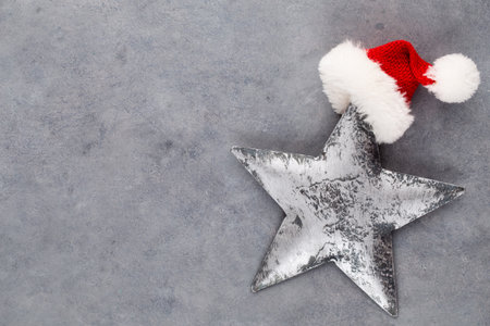 Christmas star, decor on pastel colored background. Christmas or New Year minimal concept.の写真素材