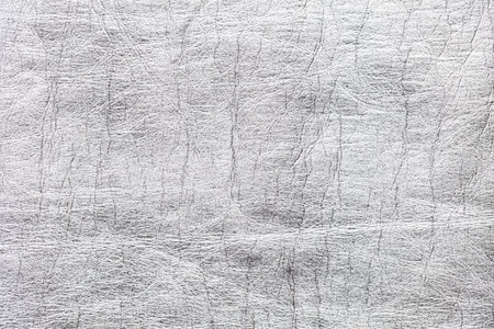 Beautiful silver vintage background. Abstract grunge decorative wall texture. Wide rough background with copy space for text.の写真素材