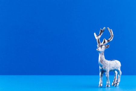 Christmas reindeer on pastel color background. Christmas or New Year minimal concept.の写真素材