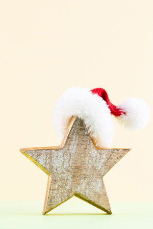 Christmas star, decor on pastel colored background. Christmas or New Year minimal concept.の写真素材