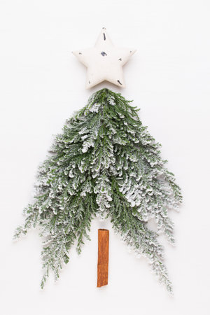 Christmas tree flat lay on the white background. New Year concept. Copy space.  Flat lay. Top view.の写真素材