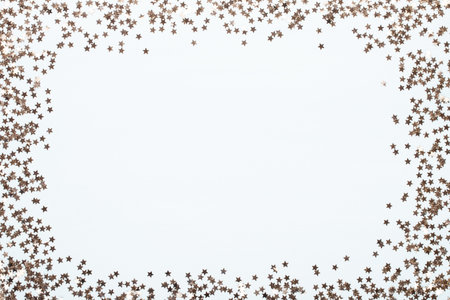 Glittering christmas background. Star dust and golden glitter. Holidays background for web and print.の写真素材