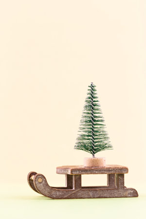 Christmas tree on pastel colored background. Christmas or New Year minimal concept.の写真素材