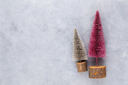 Christmas tree on pastel colored background. Christmas or New Year minimal concept.の写真素材