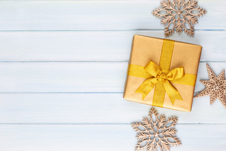 Gift or present box on color table top view. Flat lay composition for birthday, mother day or wedding.の写真素材