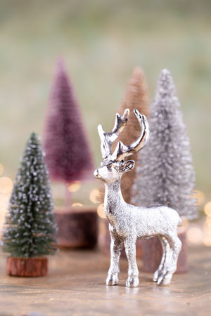 Colorful Christmas tree on green, bokeh background.の写真素材