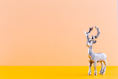 Christmas reindeer on pastel color background. Christmas or New Year minimal concept.の写真素材